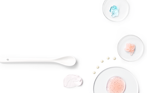 Gels and creams in scientific dishes to represent Mary Kay skin care.