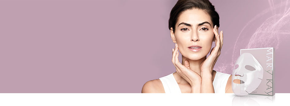 Watch the video and learn how NEW TimeWise Repair Lifting Bio-Cellulose Mask from Mary Kay works. See a visible difference in just two weeks. Image shows white background with square on right side. In square is a woman lightly touching her face with a purple background. A video play button is shown in bottom left corner of square.