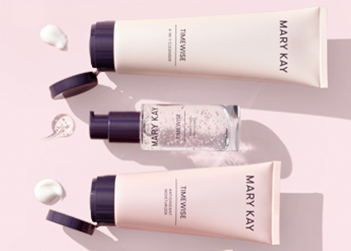 TimeWise Miracle Set nighttime routine including a cleanser, nighttime treatment product and moisturizer shown on a light pink background
