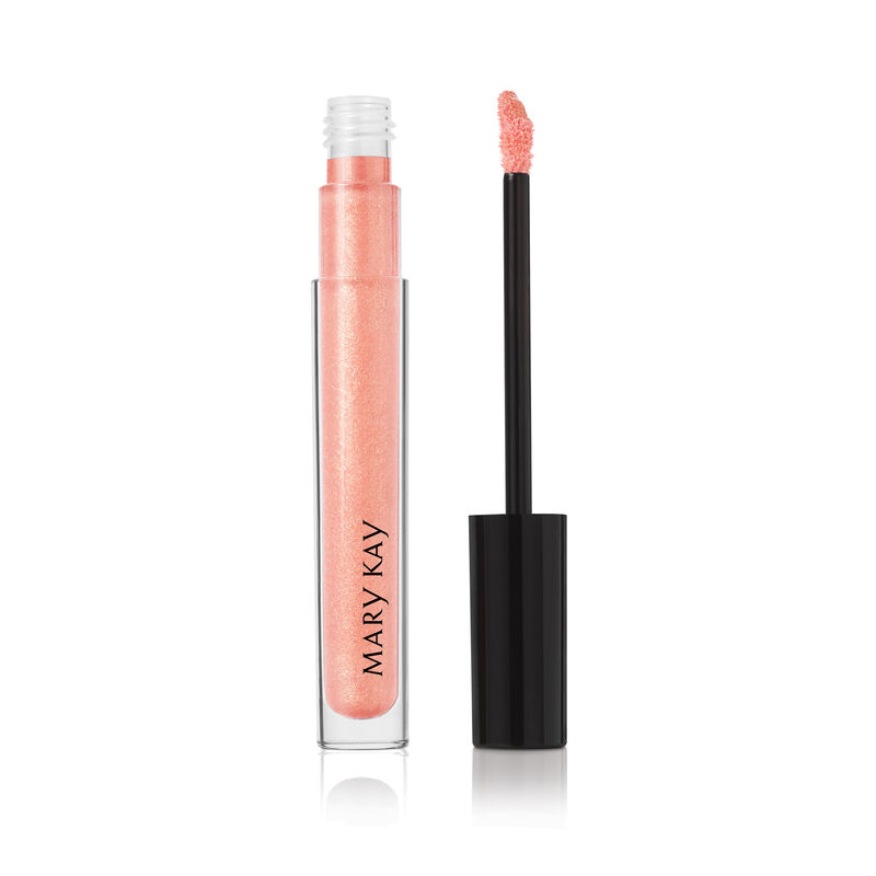 Open tube of Mary Kay Unlimited Lip Gloss in shade Sheer Illusion with accompanying applicator