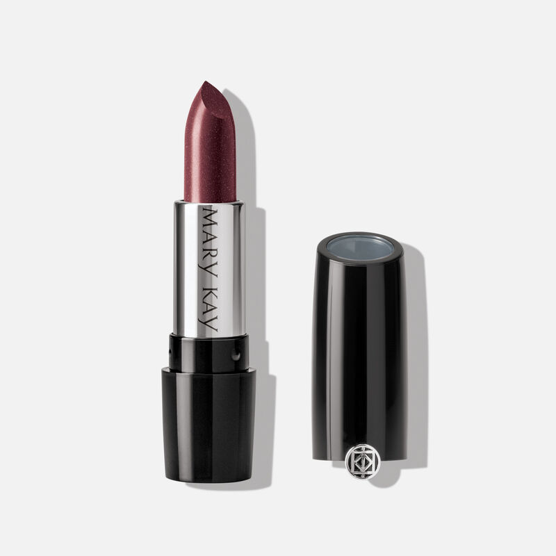 An open tube of Mary Kay Gel Semi-Shine Lipstick in the shade Berry Couture.