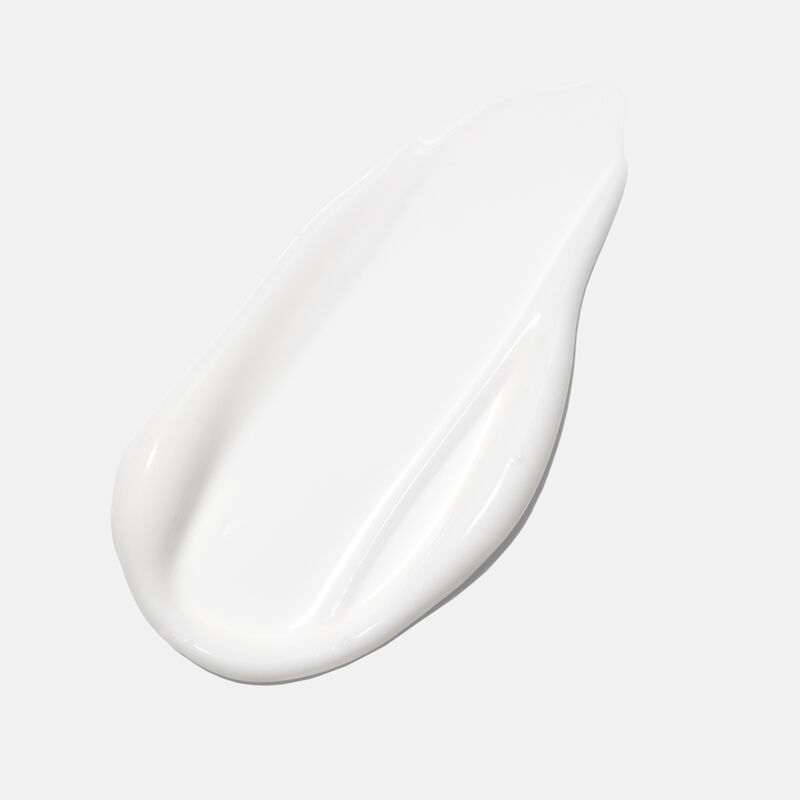 Product rub of the Normal  Dry formula of TimeWise Antioxidant Moisturizer against plain background