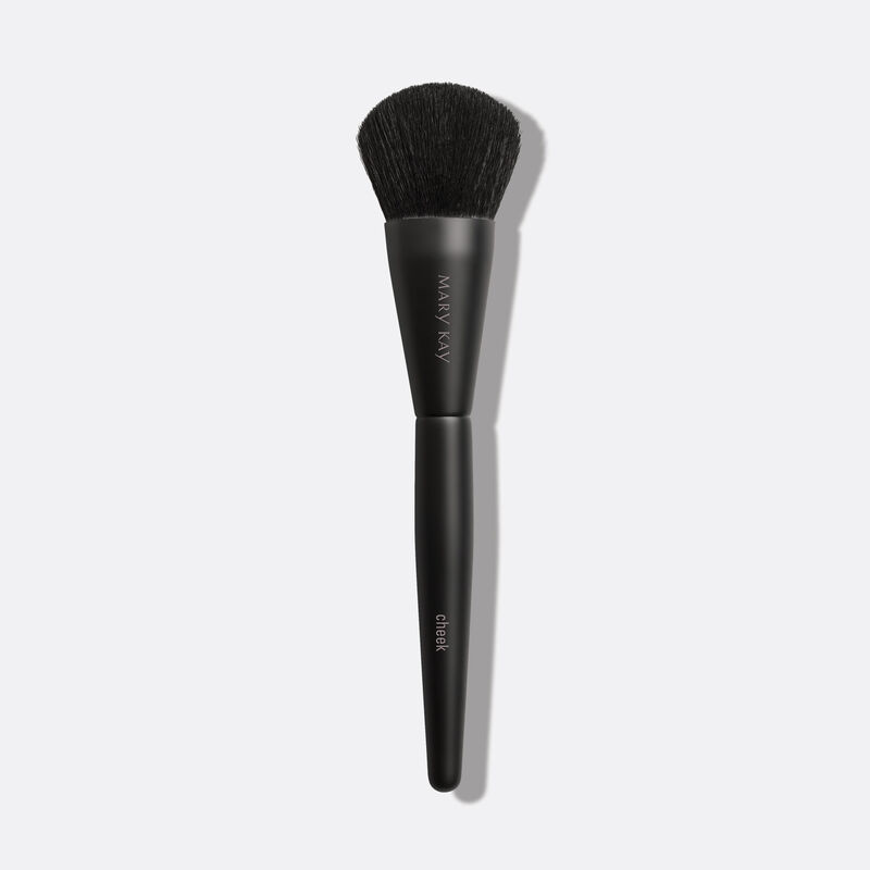 Mary Kay Cheeck Brush on plain background