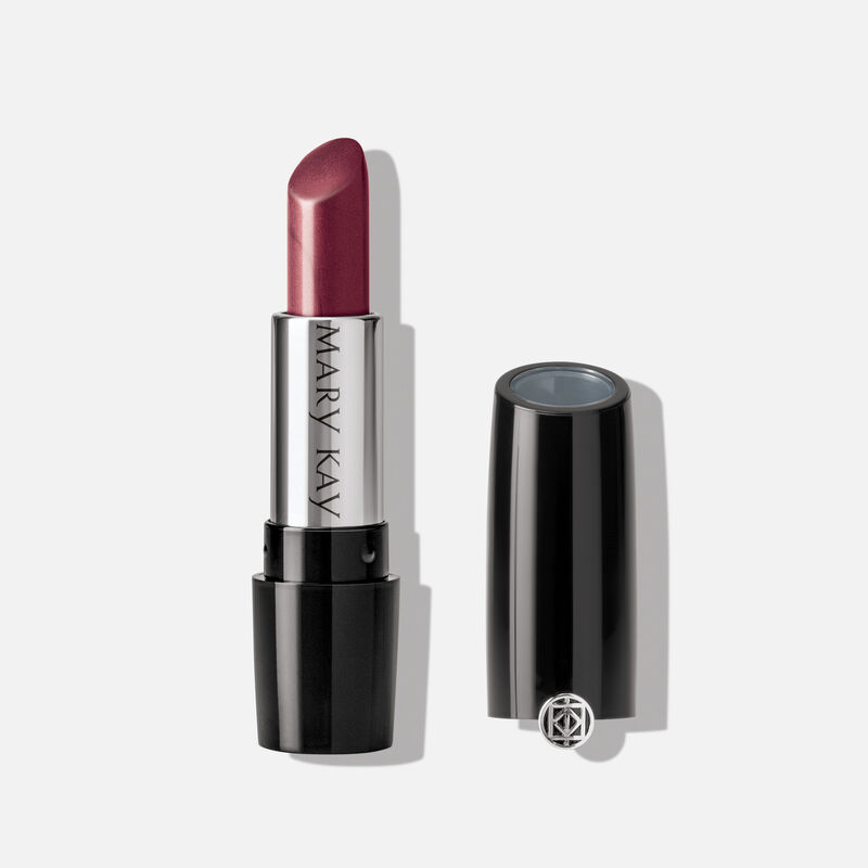 An open tube of Mary Kay Gel Semi-Shine Lipstick in the shade Apple Berry.