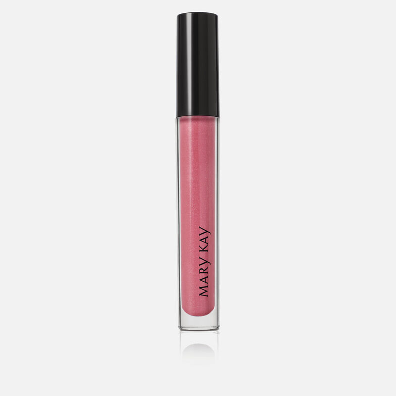 Closed tube of Mary Kay Unlimited Lip Gloss in shade Pink Ballerina standing against a grey background