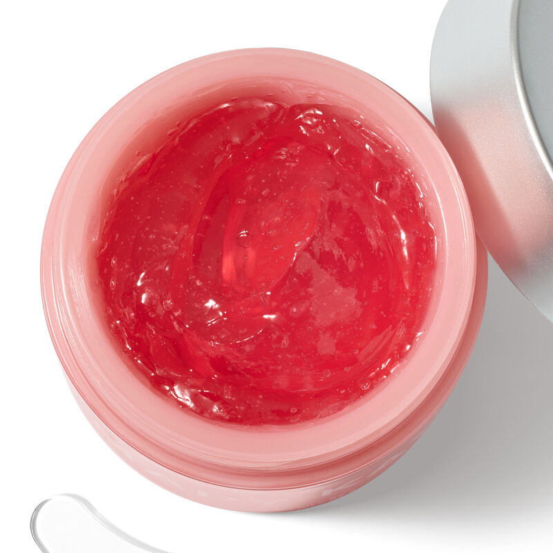 Closeup of pink collagen moisturizing gel in lighter pink jar