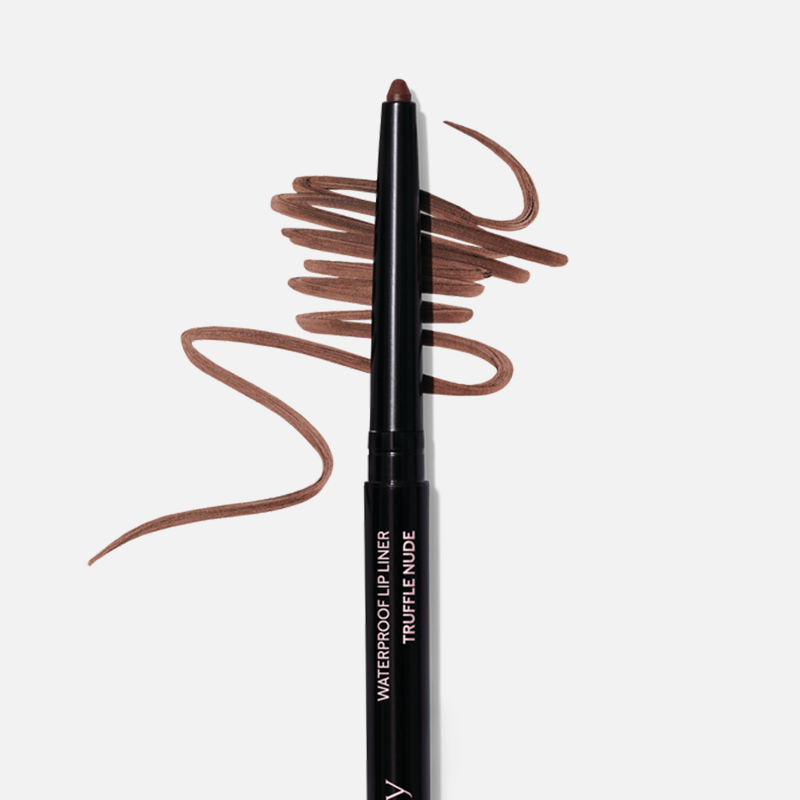 Uncapped Mary Kay Waterproof Lip Liner in Truffle Nude against plain background
