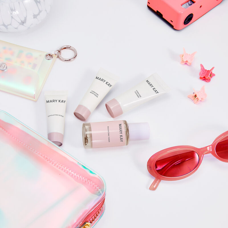 Mary Kay Skin Care Mattifying Go Set styled with pink lifestyle accessories