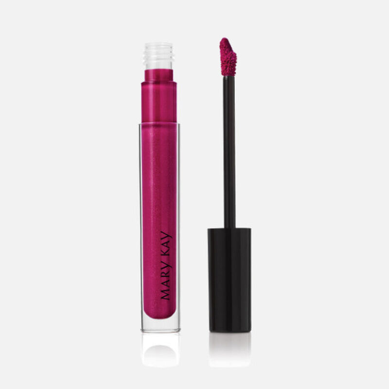 Open tube of Mary Kay Unlimited Lip Gloss in shade Berry Delight with accompanying applicator