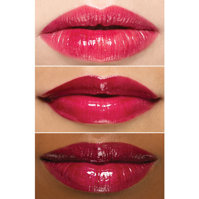 Close up of lips wearing Mary Kay Unlimited Lip Gloss in shade Berry Delight on an ivory bronze and deep skin tone