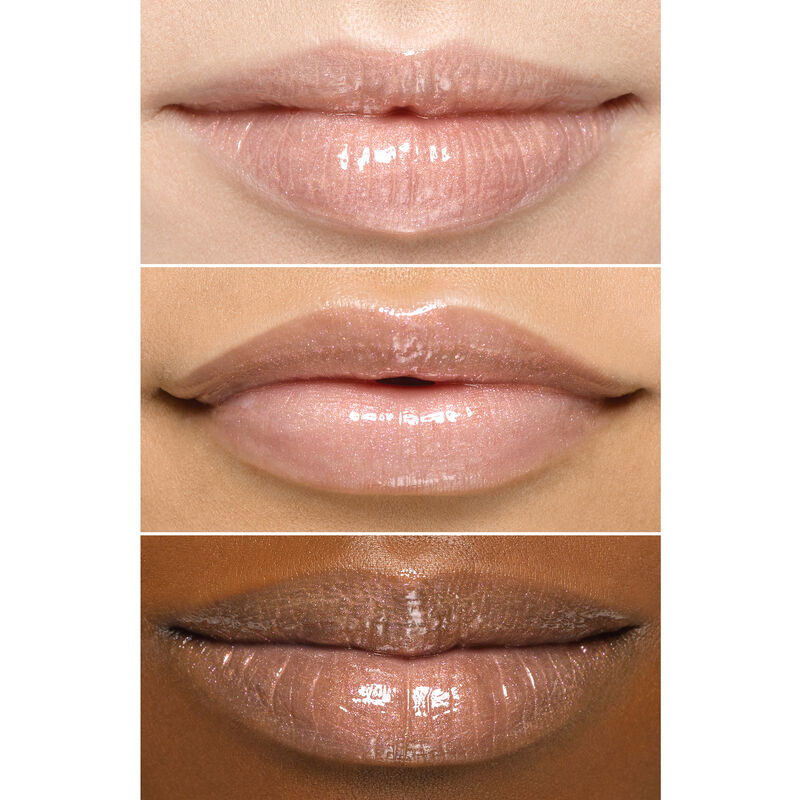 Close up of lips wearing Mary Kay Unlimited Lip Gloss in shade Sheer Illusion on an ivory bronze and deep skin tone