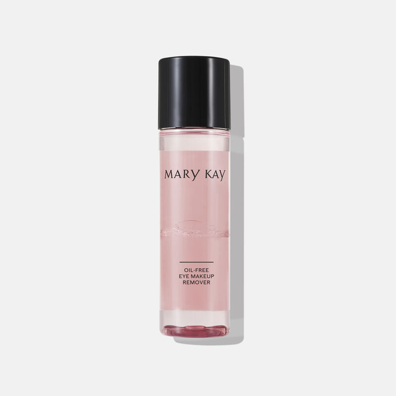 Bottle of Mary Kay Oil-Free Eye Makeup Remover standing against plain background
