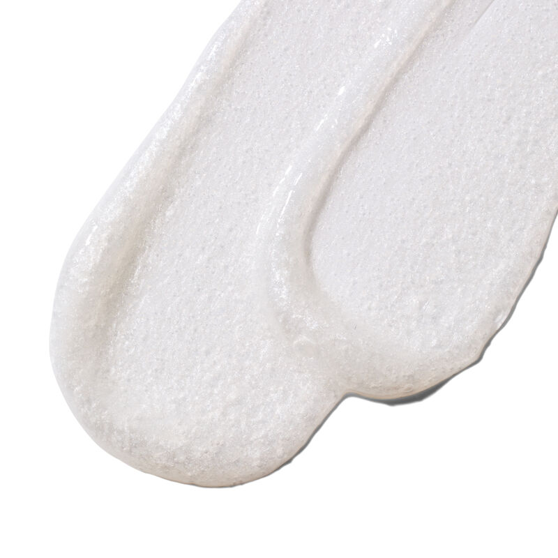 Swatch of the limitededition MKMen Invigorating Face Scrub product showing a closeup of the formula and texture