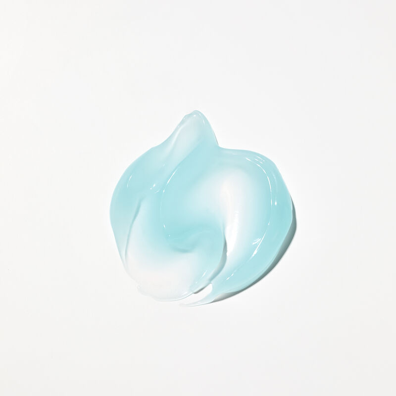 Blue gel product rub of Mary Kay&reg; After-Sun Replenishing Gel on plain background