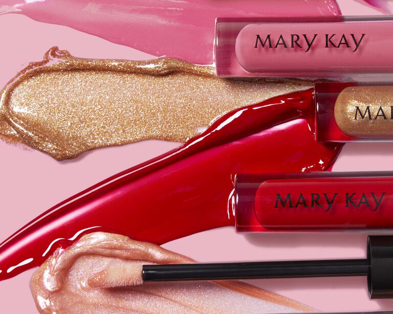 Collage of stacked product swipes featuring lip gloss.