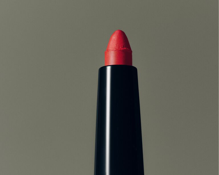 Close-up of a red lip liner pencil tip