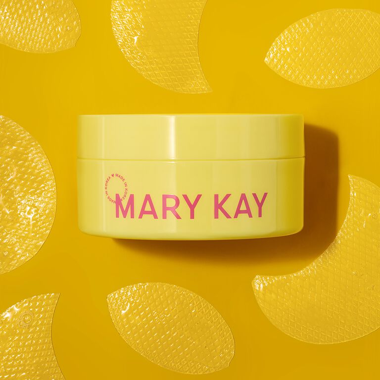 Yellow jar of Mary Kay Snail Gel Face Patches against yellow background