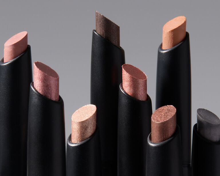 Matte and shimmer eyeshadow sticks displayed side by side