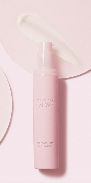 Bottle of TimeWise Replenishing Serum C+E on pink background with product swipe.