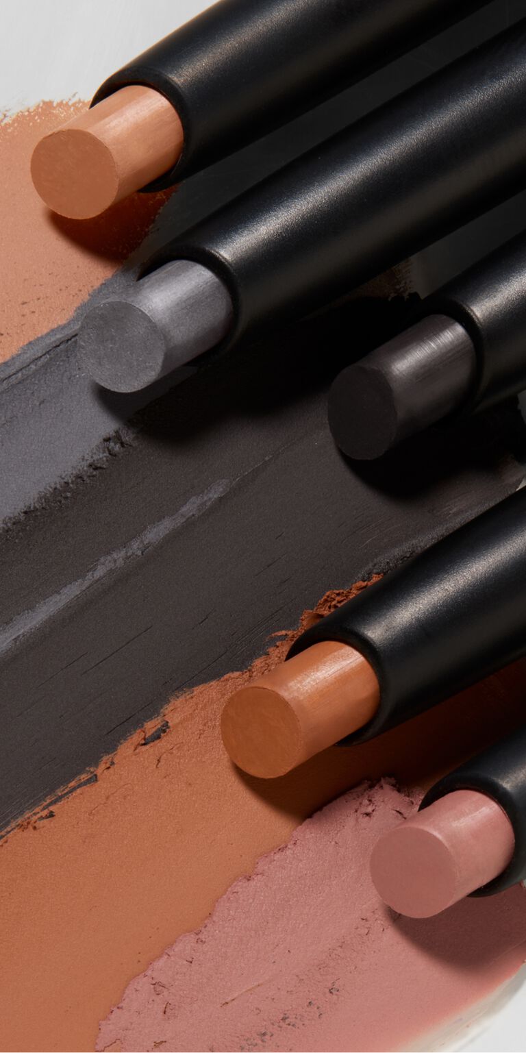 All five shades are swiped vertically across the page, showcasing the shade and the slanted tip of the product.