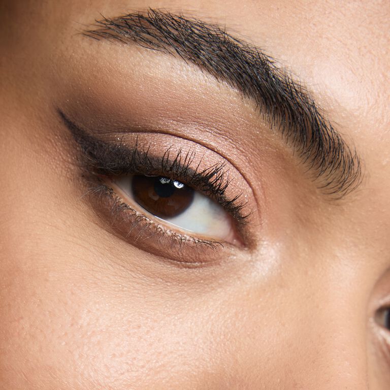 Mary Kay&reg; Matte Eye Shadow Stick in Black Obsidian is being used as an eyeliner.